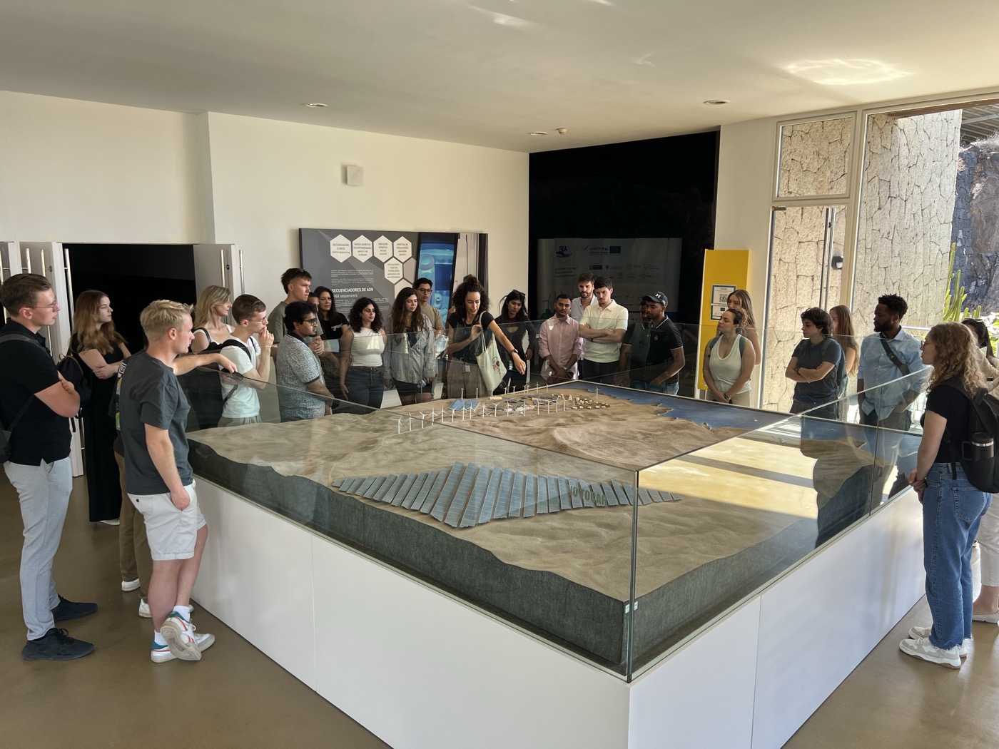 CIB 2024 students around the ITER renewable energy scale model